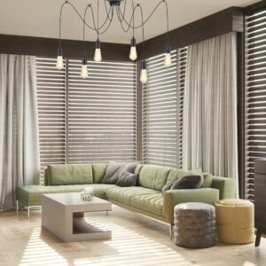 Lampe suspension araignée dans salon couleur vert