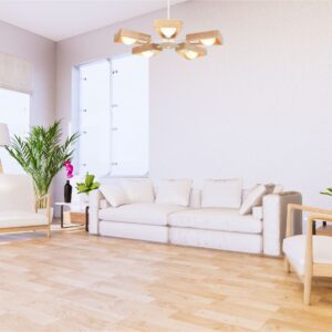 Suspension bois étoile dans le salon avec canapé blanc