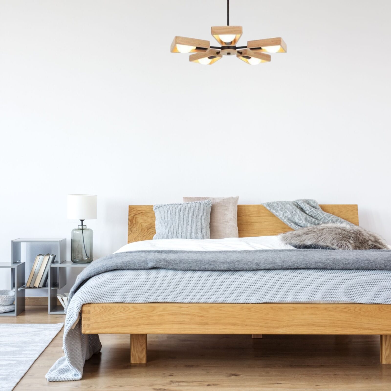 Suspension bois étoile dans chambre adulte bleu et blanc