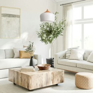 Suspension bois massif et métal dans salon clair