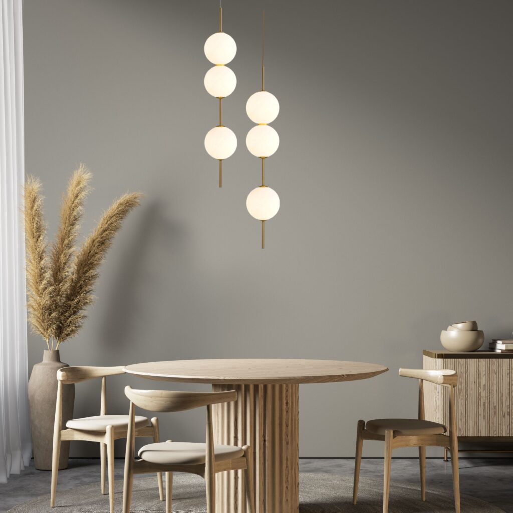Suspension boule en verre dans salle à manger avec table en pierre