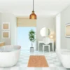 suspension verre strie orange dans salle de bain