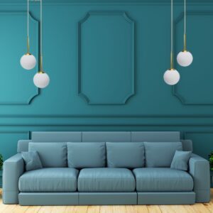 suspension boule cuivre dans salon bleu turquoise